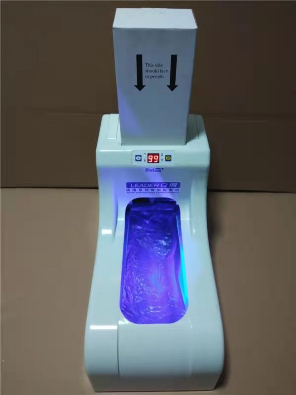 Intelligent automatic shoe cover machine